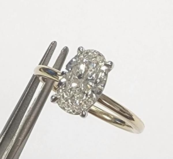 Four Prong Diamond Engagement Ring in 14K Yellow Gold with 1.50 ct Oval Center Diamond