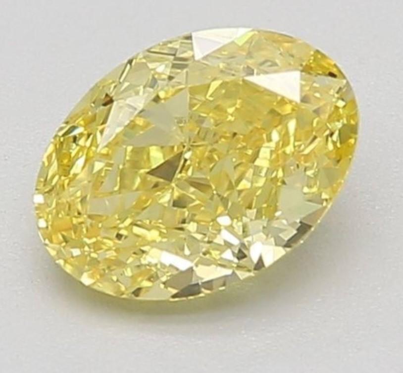 3.10 CT Oval Shape Lab Grown Loose Diamond – Fancy Vivid Yellow, VVS2 Clarity, IGI Certified (644400548)