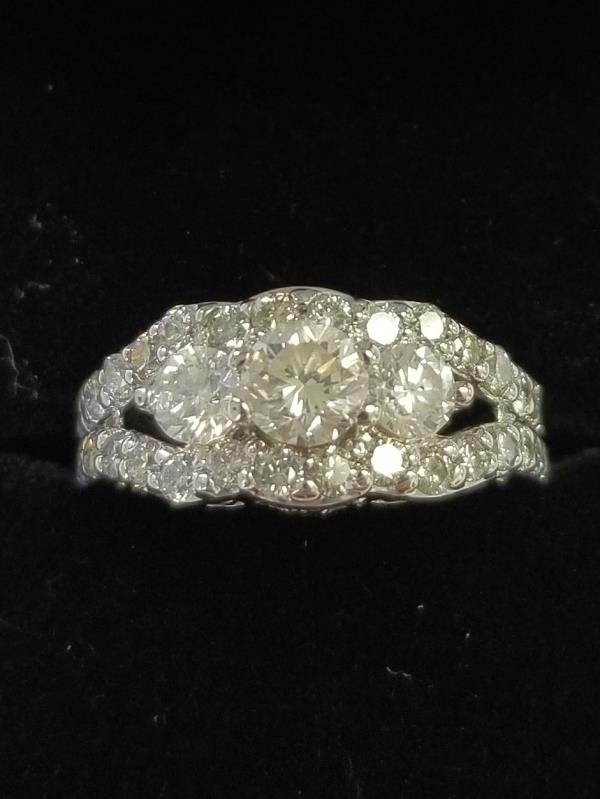 14k white round 3 stone diamond ring with split shank 1/2 way around  ||| Diamonds are 4.50 cttw ||| Ring size 5.5