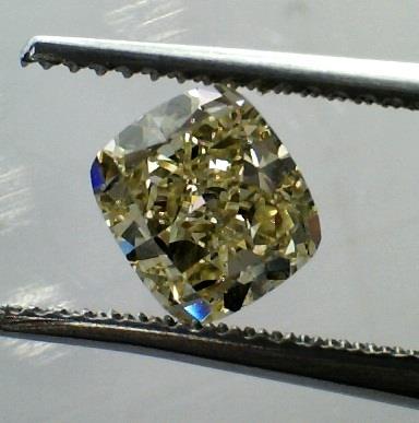 0.70cttw Cushion Modified Brilliant ||| Color: FY ||| Clarity: SI1 ||| GIA Cert: 1146594367