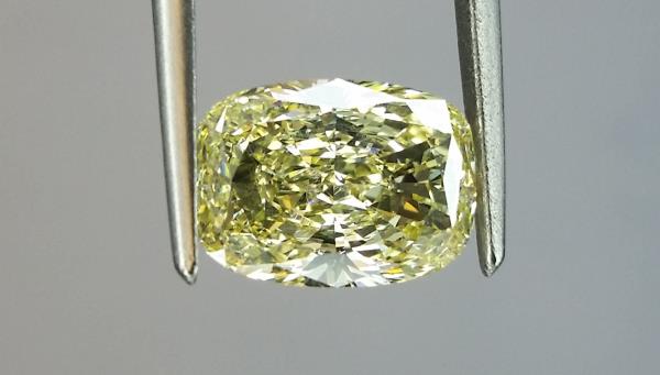 0.71cttw Cushion Modified Brilliant ||| Fancy Yellow SI1 ||| GIA Cert
