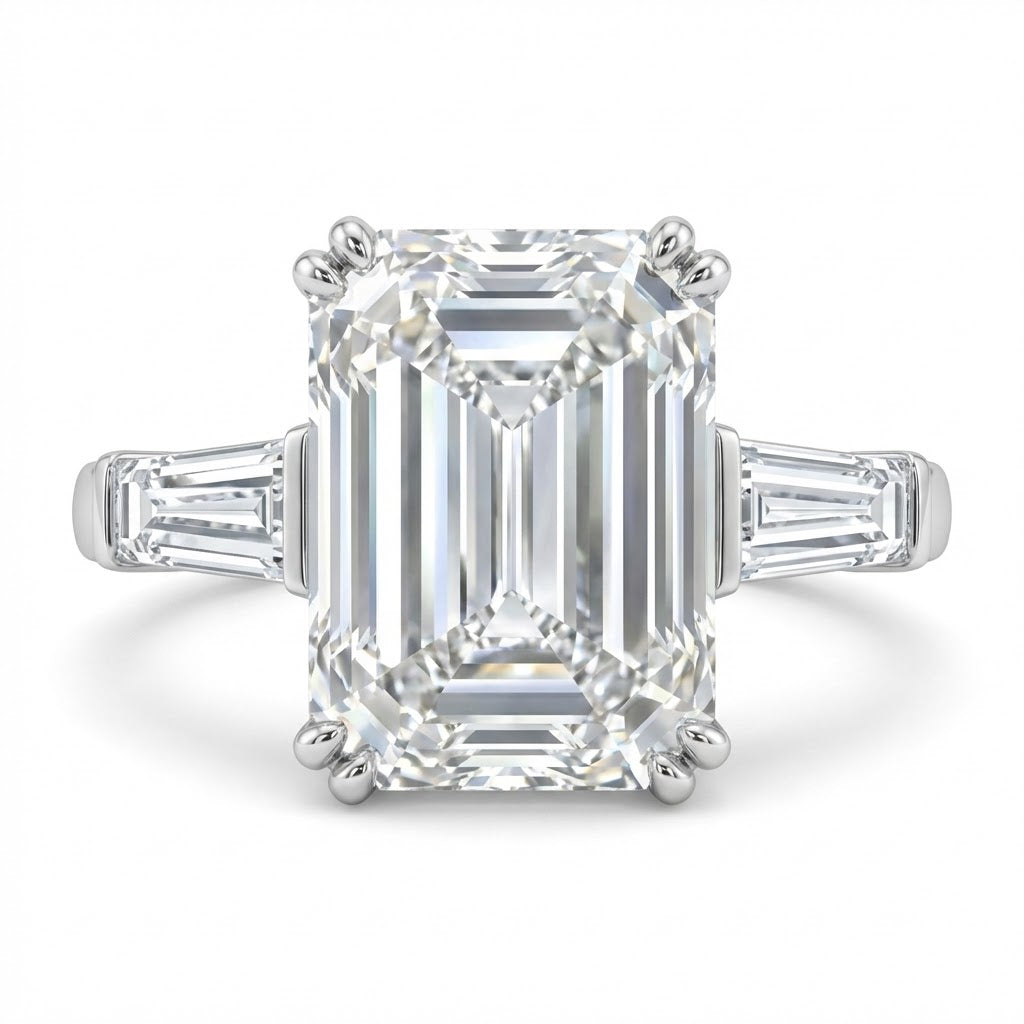 PLT three stone diamond engagement ring with two side stones, tapered baguettes, Color: H, Clarity: VVS2, 5.63cttw. Center stone Emerald cut, Weight: 5.01ct, Color: I, Clarity: VVS2, GIA cert.